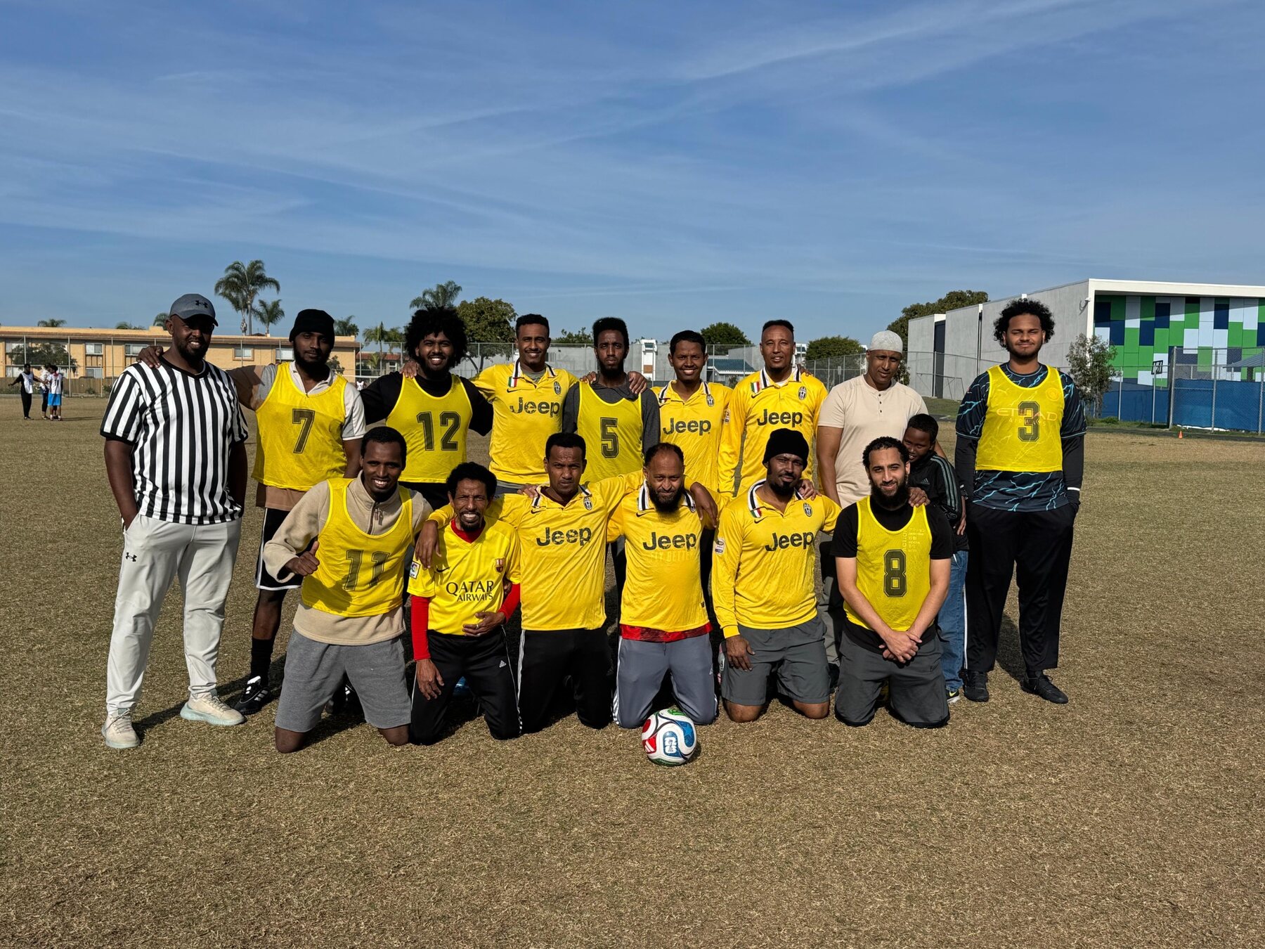 Yellow tournament team with an official
