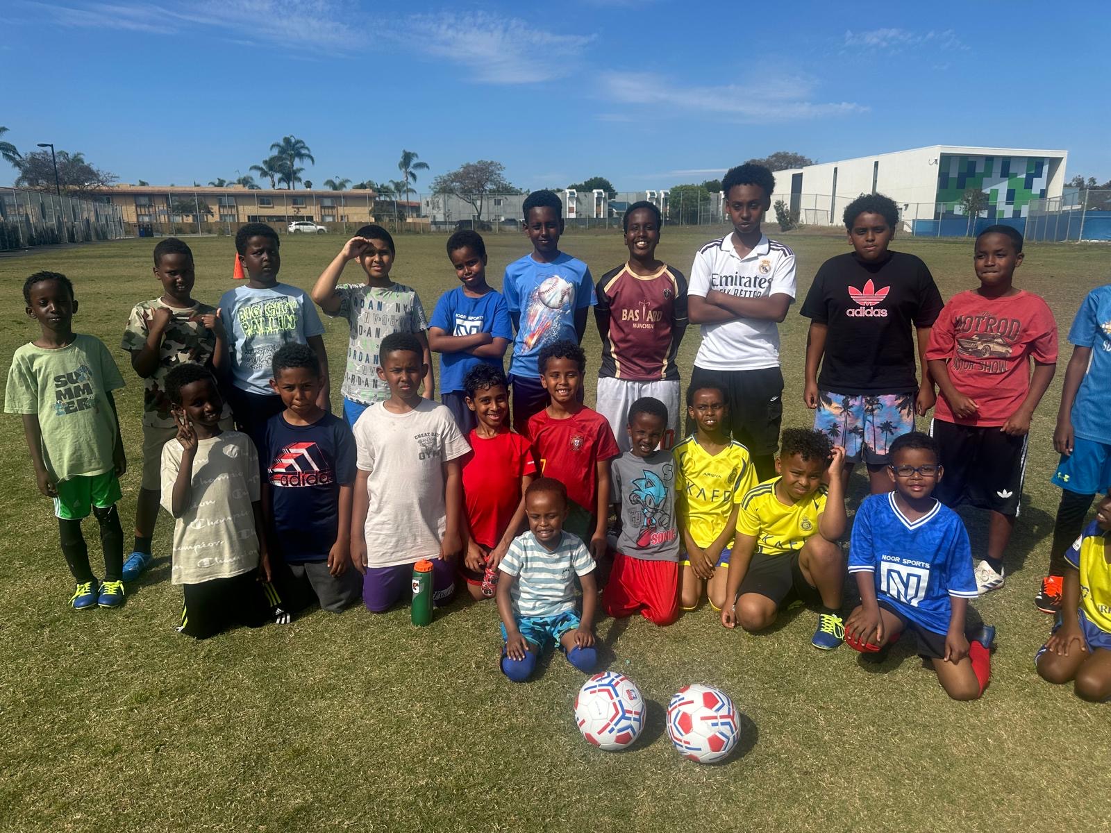 Youth soccer participants gathered after practice